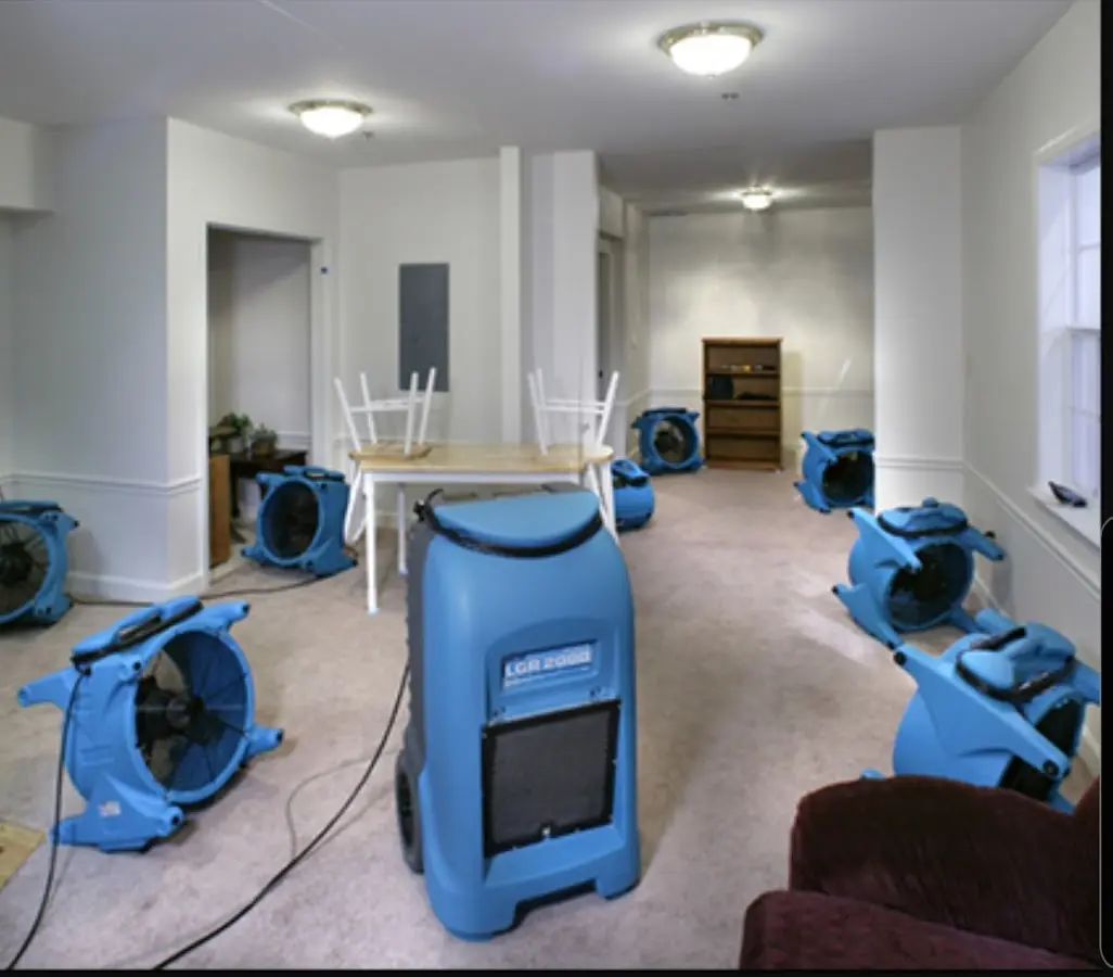 Air movers and dehumidifier setup for Water Damage Restoration in Merrydale